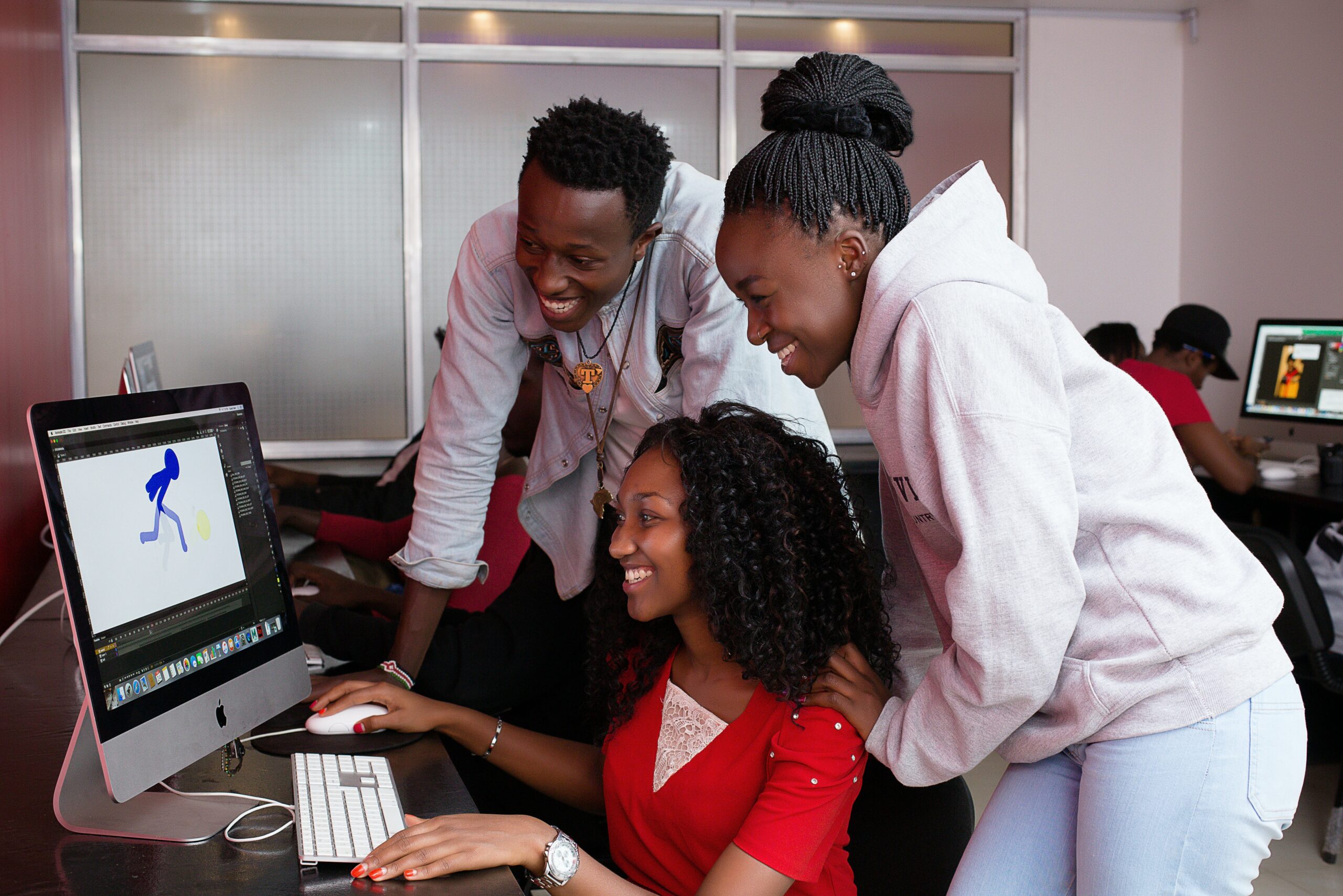 three-workers-looking-at-computer